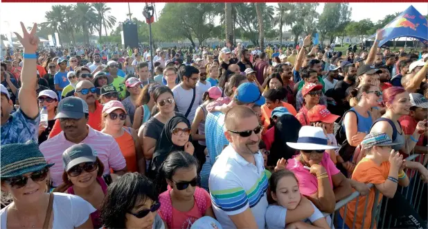  ?? Photo by Shihab ?? The crowd on the opening day of the Dubai Fitness challenge watch the different fitness activities being presented on the stage, at Safa Park on Friday. The event continues on Saturday. —