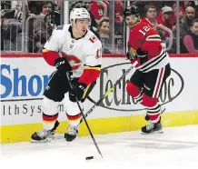  ?? JONATHAN DANIEL/GETTY IMAGES ?? Centre Mikael Backlund will be out of the Flames lineup for a while after suffering a concussion on Thursday.