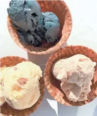  ?? COURTESY OF RUTH GALLEY'S ICE CREAM ?? Recipients choose one flavor from three for Ruth Galley's Craft Ice Cream's Pint of the Month club. In December, those flavors were charcoal buttermint, orange and clove, and gingerbrea­d cookie dough.