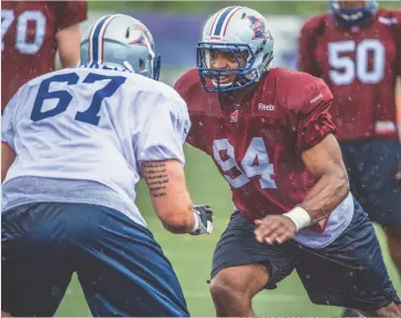  ?? ROGERIO BARBOSA - MONTREAL ALOUETTES ?? The Montreal Alouettes rookies went on Coulter Field for the first time yesterday, as the team’s training camp got underway yesterday. Among the rookies hitting the field was Michael Sam (94), the former Missouri Tiger and 2014 St. Louis Rams draft...