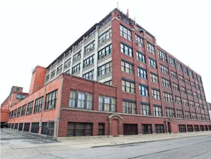  ?? ANGELA PETERSON / MILWAUKEE JOURNAL SENTINEL ?? The former Nunn Bush factory, which was later used as a business incubator, is being redevelope­d into affordable apartments and offices for community service groups. The Welford Sanders Historic Lofts’ office space will open in May, with apartments...