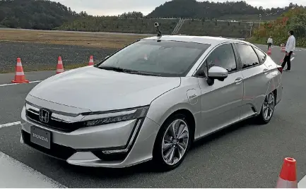  ?? ROB MAETZIG/STUFF ?? The Honda Clarity - now available in the United States and Japan as an electric vehicle, plug-in hybrid, and hydrogen fuel-cell car.