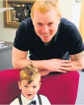  ??  ?? Hoop hoop hurray Finn Muir with Neil Lennon at St Andrew’s Hospice