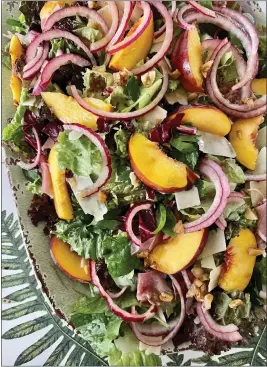  ?? PHOTO BY CATHY THOMAS ?? in small bowl whisk lemon juice, honey, shallots and salt; while whisking, add oil in a thin steam. Taste and adjust seasoning as needed.
2. Add dressing to lettuce mixture; toss.
3. Divide salad among plates. Top with pistachios and cheese.