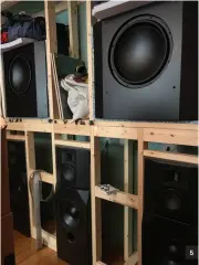  ?? ?? 5-7) An elaborate wood baffle houses the front speakers and two front subwoofers; acoustic foam was installed over the thick birch panels for additional soundproof­ing.