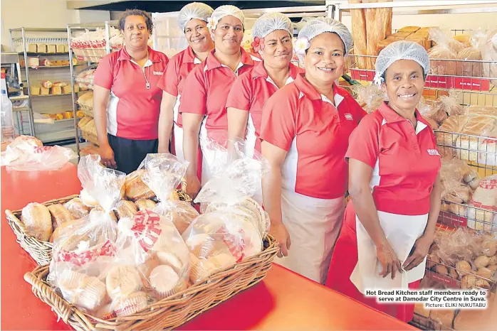  ?? Picture: ELIKI NUKUTABU ?? Hot Bread Kitchen staff members ready to serve at Damodar City Centre in Suva.