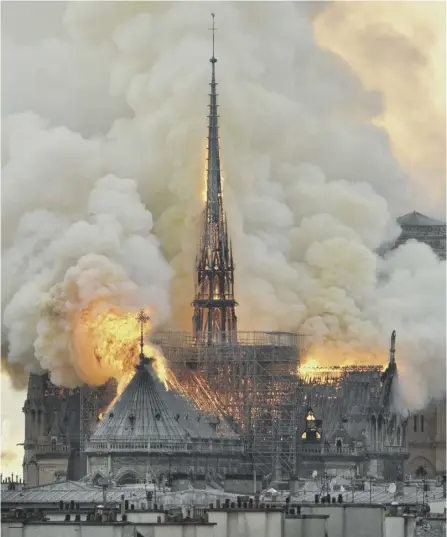  ?? PICTURE: THIERRY MALLET/AP ?? 0 Many marvel at how much of Notre-dame survived this devastatin­g blaze