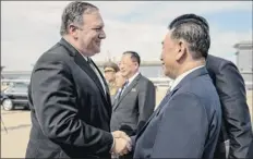  ??  ?? Andrew Harnik, Pool / Associated Press U.S. Secretary of State Mike Pompeo says goodbye toKim Yong Chol, North Korean senior party official and exintellig­ence chief, in Pyongyang on Saturday.