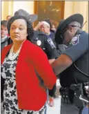  ?? John Bazemore ?? The Associated Press Police arrest state Sen. Nikema Williams, D-atlanta, during a protest over election ballot counts Tuesday in the rotunda of the Georgia Capitol in Atlanta.