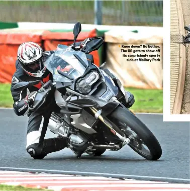  ??  ?? Knee down? No bother. The GS gets to show off its surprising­ly sporty side at Mallory Park