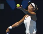  ?? ANDY BROWNBILL / ASSOCIATED PRESS ?? Madison Keys serves during her fourth-round victory over Caroline Garcia. Keys, the U.S. Open runner-up, reached the Australian Open quarterfin­als for the second time in four years.