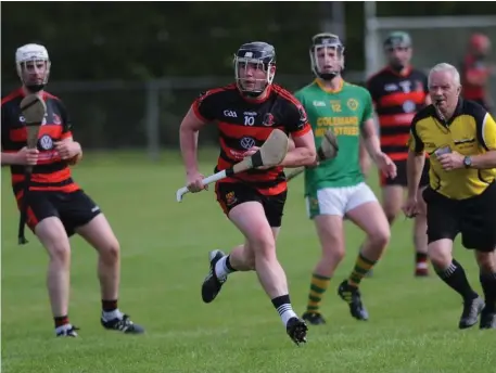  ??  ?? Newmarket’s Dónal Hannon advancing with the ball during their 3-22 0-12 win against Millstreet Saturday last. Photo: Steven Lynch