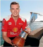  ??  ?? Scott McLaughlin is all smiles with his Supercars trophy.