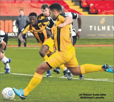  ??  ?? Jai Reason tucks away Maidstone’s penalty