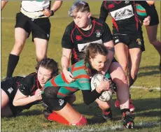  ?? Photograph: Stephen Lawson ?? Sophia Rosinski dives over to score Oban’s try.