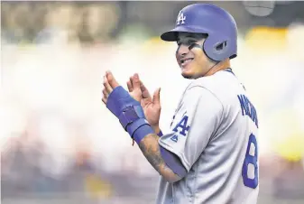  ?? Stacy Revere / Getty Images 2018 ?? Manny Machado, acquired via trade from Baltimore on July 18, helped the Dodgers reach the World Series for a second straight year, but he batted .227 in the postseason.