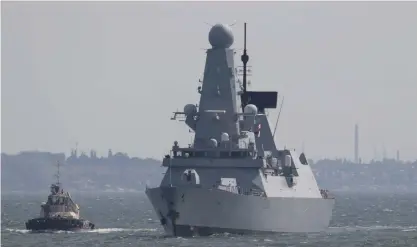  ?? (Sergey Smolentsev/Reuters) ?? THE BRITISH Royal Navy’s Type 45 destroyer ‘HMS Defender’ arrives at Ukraine’s Black Sea port of Odessa on Friday.