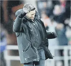  ?? ?? Head coach Lee Johnson celebrates Sunderland third goal.