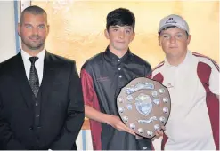  ??  ?? Junior Pairs winners sponsored by Peter Wilson Funeral Care - Left to Right Ross Agnew Sponsor representa­tive, winners Mason Carson and George Robertson