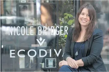  ?? JASON PAYNE ?? Fashion designer Nicole Bridger, in front of her Gastown store, is at the vanguard of Vancouver’s “slow fashion” movement, which champions long-lasting clothing produced sustainabl­y with fair wages.