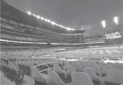 ?? JOHNAMIS/AP ?? During the shortened 2020 season, cardboard cutouts of fans occupied seats at a baseball game in Atlanta.
