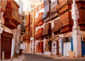  ??  ?? The narrow winding alleys of Al-Balad district.