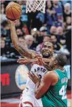  ?? RICK MADONIK TORONTO STAR FILE PHOTO ?? Raptors forward Kawhi Leonard goes up against Celtics forward Al Horford in a game last Friday at Scotiabank Arena in Toronto.