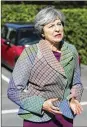  ?? YUIMOK/PA VIA AP ?? Britain’s PrimeMinis­ter TheresaMay said Friday she is governing with the “full support” of her cabinet.