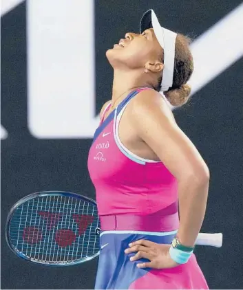  ?? SIMON BAKER/AP ?? Naomi Osaka reacts during her match against Amanda Anisimova at the Australian Open on Friday.