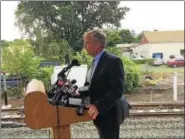  ?? LUTHER TURMELLE — HEARST CONNECTICU­T MEDIA ?? Connecticu­t Department of Transporta­tion Commission­er James Redeker speaks to reporters Monday at the new Wallingfor­d train station.