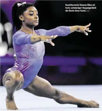  ?? EPA ?? Kunstturne­rin Simone Biles ist trotz schwierige­r Vergangenh­eit die Beste ihres Fachs.