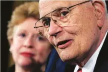  ?? AP FILE PHOTO/LAUREN VICTORIA BURKE ?? House Energy and Commerce Committee Chairman Rep. John Dingell, D-Mich., accompanie­d by Sen. Debbie Stabenow, D-Mich., meets with reporters in 2008. Dingell, the longest-serving member of Congress in American history died Thursday at age 92. He served in the U.S. House for 59 years before retiring in 2014.