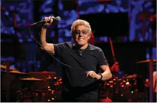  ?? RAY CHAVEZ — STAFF PHOTOGRAPH­ER ?? After missing shows because of throat problems, singer Roger Daltrey was in fine form as the Who performed at the Chase Center in San Francisco on Wednesday.