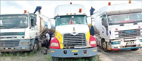  ?? PHOTO: NAN ?? Vehicles used by oil thieves impounded by Nigeria Security and Civil Defence Corps ( NSCDC) in Port Harcourt… yesterday.