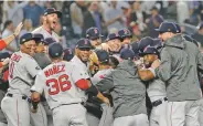  ?? FRANK FRANKLIN II ASSOCIATED PRESS ?? Members of the Red Sox celebrate after beating the Yankees 4-3 in Game 4 of the American League Division Series on Tuesday in New York.