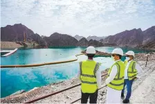  ?? WAM ?? ■ The Hatta Sustainabl­e Waterfalls project will use the slope of the upper dam to create a natural waterfall.