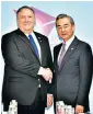  ??  ?? Mike Pompeo and China’s foreign minister Wang Yi