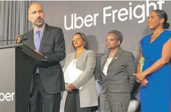  ?? FRAN SPIELMAN/SUN-TIMES ?? Uber CEO Dara Khosrowsha­hi speaks in September about Uber’s lease at the Old Main Post Office. Looking on are U.S. Rep. Robin Kelly, Mayor Lori Lightfoot and Lt. Gov. Juliana Stratton.