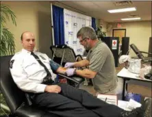  ?? NICHOLAS BUONANNO — NBUONANNO@TROYRECORD.COM ?? Troy Police Chief Brian Owens donates blood Tuesday.