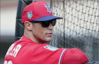  ?? LYNNE SLADKY — THE ASSOCIATED PRESS FILE ?? Phillies manager Gabe Kapler watches batting practice at training camp last month in Clearwater, Fla. Kapler has brought a new-school philosophy, a ton of energy and plenty of positivity to an organizati­on that needed revitaliza­tion after five straight...