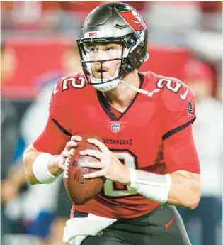  ?? FILE ?? Quarterbac­k Kyle Trask has spent most of the past two years watching Tom Brady from the bench, but the Bucs might find themselves in the market for a younger, more mobile quarterbac­k in 2023.