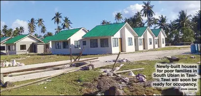  ?? JOHN UNSON ?? Newly-built houses for poor families in South Ubian in TawiTawi will soon be ready for occupancy.