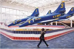  ??  ?? Visitors to the National Naval Aviation Museum can see a variety of restored, rare and one-of-a-kind U.S. Navy aircraft, including Blue Angels A-4F Skyhawk II aircraft flown from 1974 to 1986.