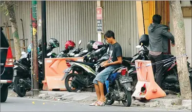  ?? BOY SLAMET/JAWA POS ?? BUTUH KONSISTENS­I: Titik parkir di Jalan Gajah Mada termasuk dalam pengawasan tim khusus bentukan Dishub Sidoarjo.