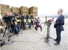  ?? — AFP ?? Britain’s Chancellor of the Duchy of Lancaster Michael Gove speaks to members of the media on a visit to the border between Northern Ireland and Republic of Ireland at Warrenpoin­t Port on Friday, during a visit to Northern Ireland.