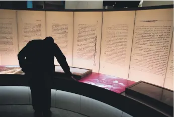  ?? AFP ?? The Dead Sea Scrolls exhibition at Steve Green’s Museum of the Bible in Washington. On Monday, the museum announced five of its 16 scrolls had been proven to be fake ROB CRILLY New York