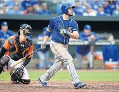  ?? AFP ?? The Royals’ Mike Moustakas hits a grand slam in the seventh inning against the Orioles.