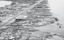  ?? Staff file photo ?? A single house is left standing in Gilchrist after Hurricane Ike in 2008. The storm led to the proposal of a coastal barrier project.