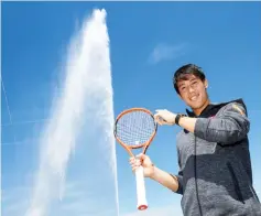  ?? - AFP photo ?? Japan tennis player Kei Nishikori poses in front of the Jet d’Eau (the landmark fountain of Geneva) during a photo session ahead of his first game at the Geneva Open ATP 250 Tennis tournament in Geneva.