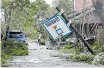  ??  ?? Mangkhut caused widespread wind damage across Tuguegarao city.